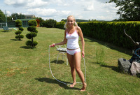 Cute blonde Lola jumping rope and teasing outdoors #02