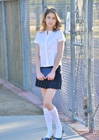Cute teen Kristen teasing outdoors in schoolgirl uniform #03